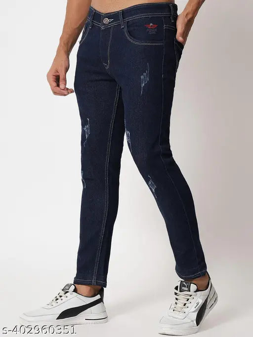 Dark blue denim slim fit jeans with distressed knee areas