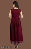 Rayon printed maroon straight Nayra cut kurta for women/girls, embroidered sleeveless design in classic, trendy style. Made for comfort during weddings and special occasions. Indian origin." (106 characters)