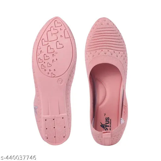 Pink bell-toe sneakers with hearts on soles