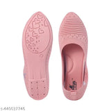 Pink bell-toe sneakers with hearts on soles