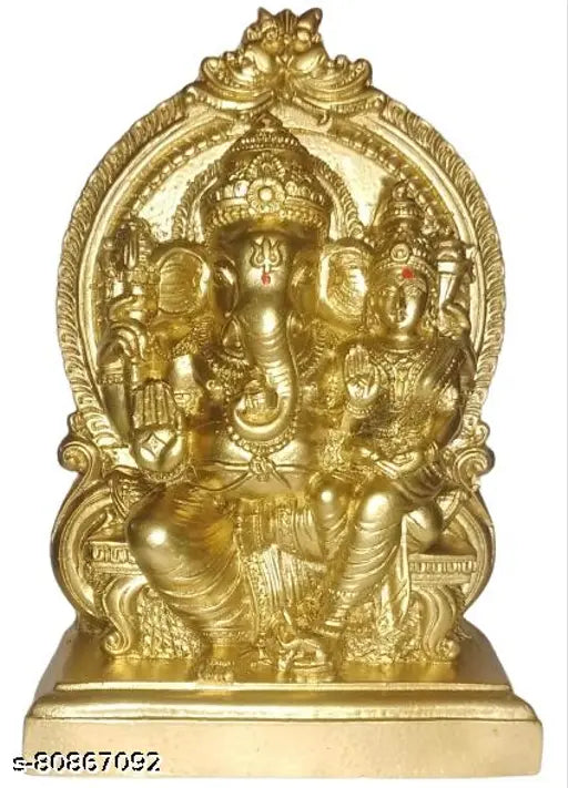 Golden Lakshmi Ganesha idol, traditional Hindu deity, seated on lotus pedestal