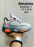 Grey and orange men's running shoe with spiked sole