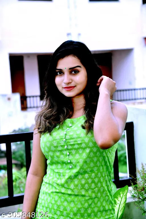 Green rayon sleeveless kurta with palazzos, printed net design, Vikanshi International Present