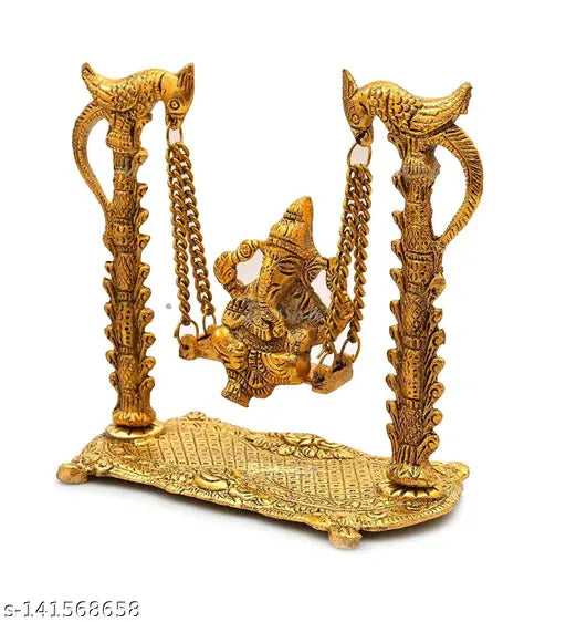Antique finish golden brass Ganesh Jhula Swing, handcrafted Indian oxide metal Lord Ganesha idol on peacock jhoola, perfect for home decor and spiritual gifts