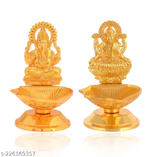 Golden finish Karauli Collection metal Ganesh Laxmi idol diya oil lamp, 5cm x 8cm x 7cm, handcrafted in India. Perfect for home or office puja decor