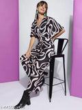 Women's poly blend printed V-neck western jumpsuit, featuring short sleeves and vibrant Rama, Pink, Black, or Orange colors. Durable, wrinkle-resistant, and breathable fabric. Perfect for versatile styling from casual to western looks. Size S to XXL. Made in India