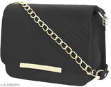 Black quilted shoulder bag with chain link detail