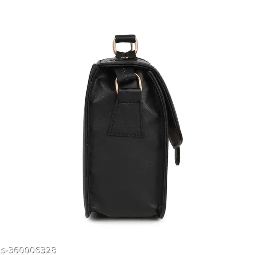 Women's black sling bag with leather trim, adjustable strap