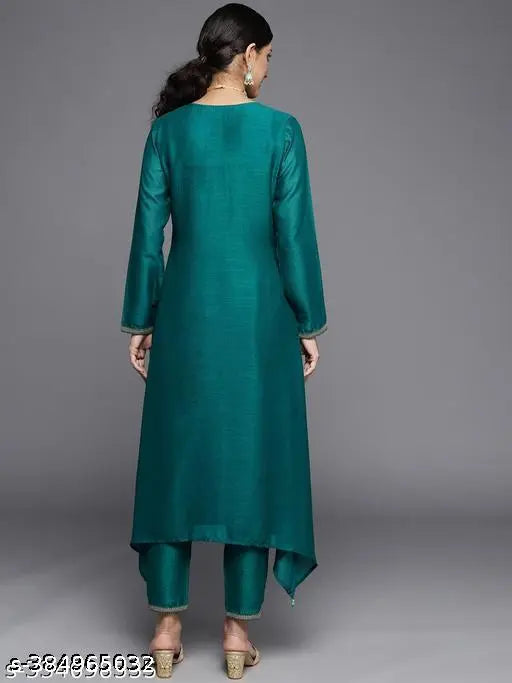 Teal green Vichitra silk kurta with round neckline, three-quarter sleeves, intricate embroidery, and asymmetrical hemline. Ideal for light festivities. India origin