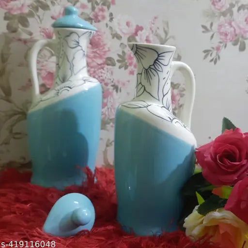 Blue ceramic oil dispenser with lid, ideal for kitchen storage. Microwave safe, 100% food grade material. Perfect for home and restaurant use