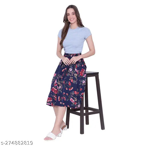 Floral print skirt, blue top, white straps