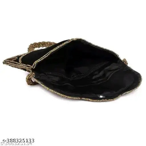 Black embroidered women's clutch with zip closure