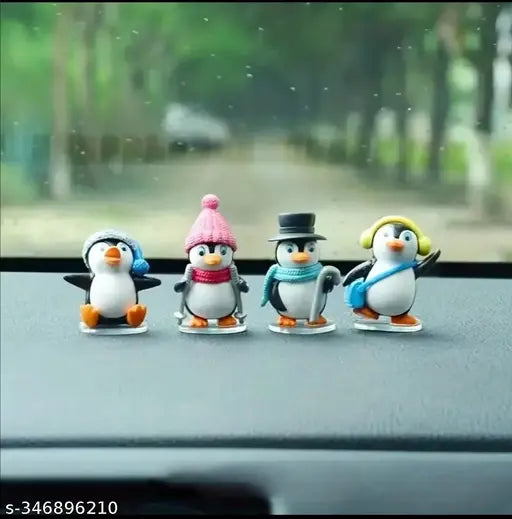 Transparent adhesive Antique Creation car dashboard playing penguin, whimsical automobile showpiece for Indian art enthusiasts