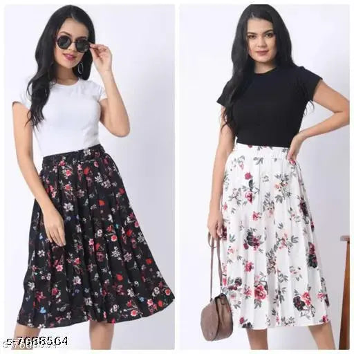 Black and white floral pleated midi skirt with ruffle trim, short sleeved white blouse