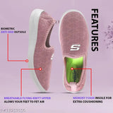 A pair of pink women's slip-on sneakers with a design feature, breathable flying knight upper air cushioning