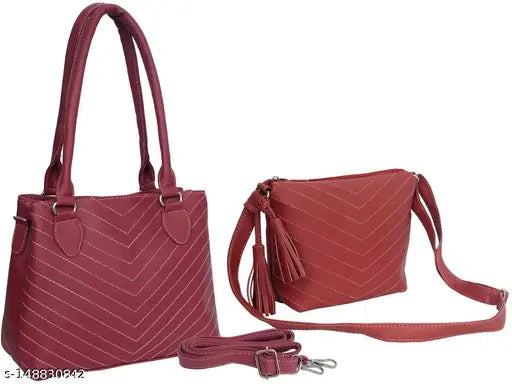 Red purse with shoulder strap, two compartments, and tassel closure