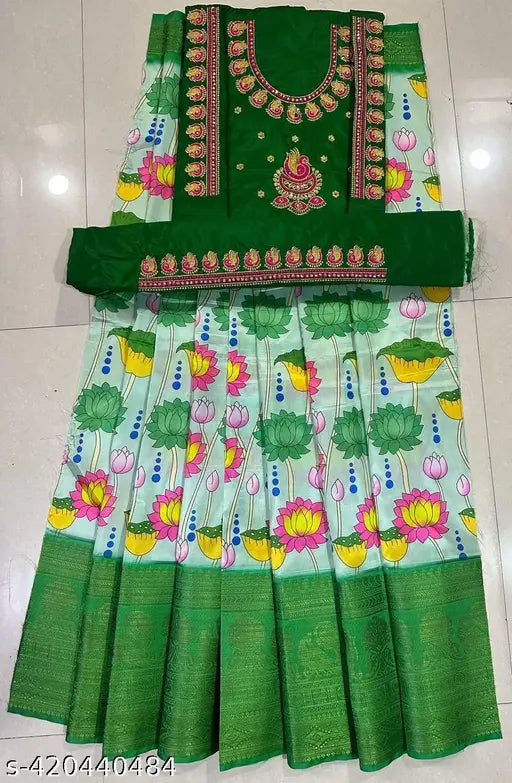 Green cotton silk and acrylic unstitched Kalamkari lehenga choli with heavy embroidery work and floral patterns, suitable for kids aged 3 to 8 years
