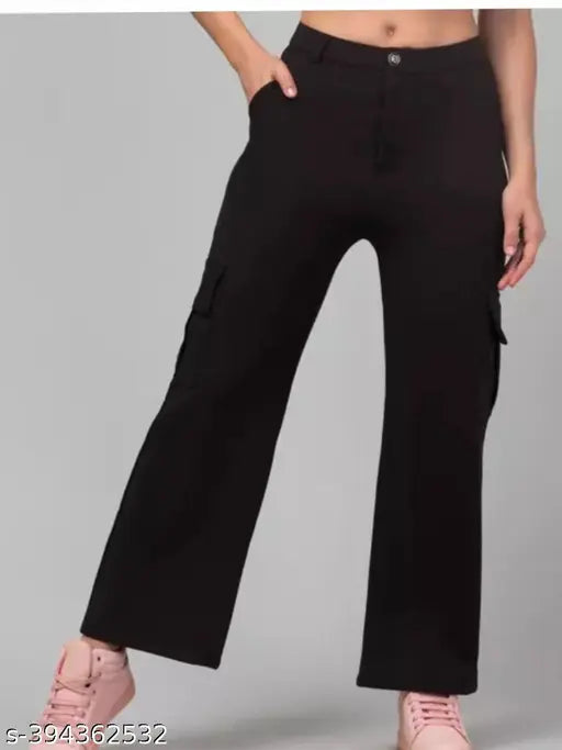 Black cotton blend cargo pant 543, ideal for a casual fit. Solid design, available in sizes 26, 28, 30, 32 (waist 26/28/30/32, length 29/30/31/32, hip 26/28/30/32). Made in India