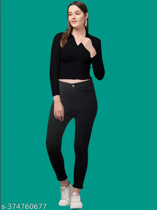 Black polyester blend casual top, long sleeves, V-neck collar, 20 inches length