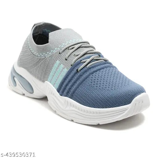 Blue, white, and grey sneaker with a blue sole and laces. A trendy casual shoe for boys by TOMSY CHOICE. Perfect for running, walking all day, or smart casual wear