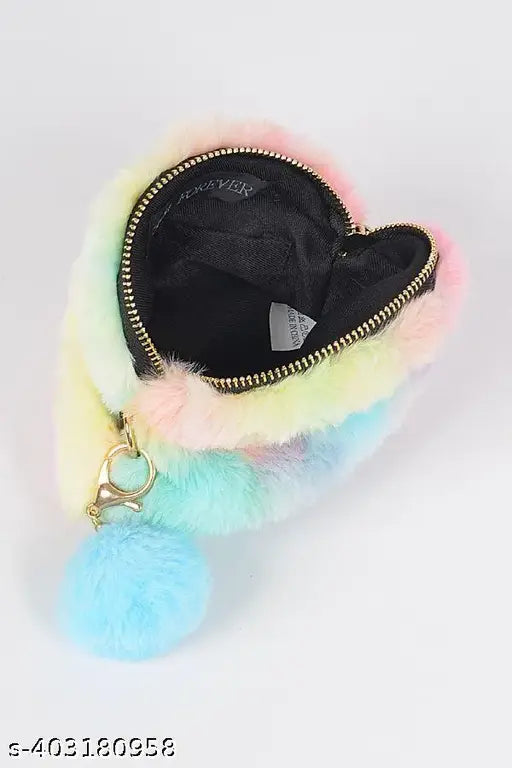 A multicolored round crossover fashion bag with a large pink heart and zip closure