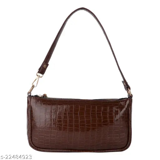 A brown, leather sling bag with shoulder strap