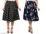 Black polka & white floral print mid calf length women's IBPanel polyester skirt combo, featuring a crepe fabric and flared style. Size options available: 26 (waist 26in, hip 36in), 28 (waist 28in, hip 38in), 30 (waist 30in, hip 40in), 32 (waist 32in, hip 42in), 34 (waist 34in, hip 44in). Origin: India