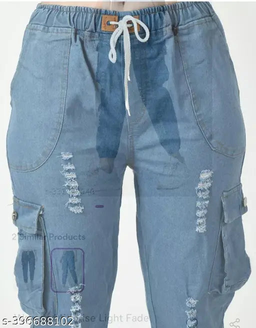 Women's denim jogger pants with ripped details and zipper pocket