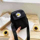 Black cotton canvas bag with white daisy embroidery and adjustable strap
