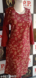Red long sleeved floral print dress