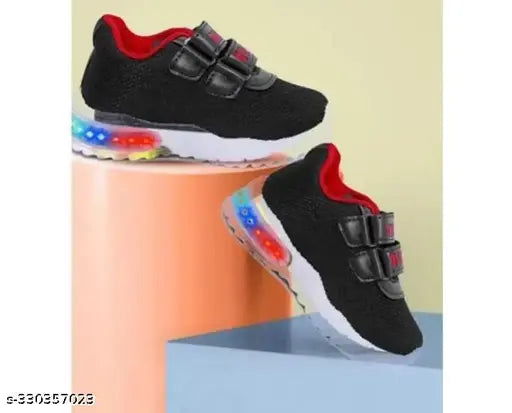 Black and red sneakers with velcro closures