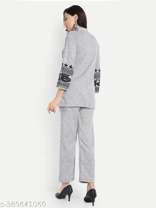 Light Grey Wool Embroidery Night Suit Set - Elendra Trending Karachi Co-ords for Winter Sleepwear, featuring a tunic and palazzos with red and multicoloured embroidery, mandarin collar, three-quarter sleeves, black and multicoloured striped palazzos with elasticated waistband. Made in India