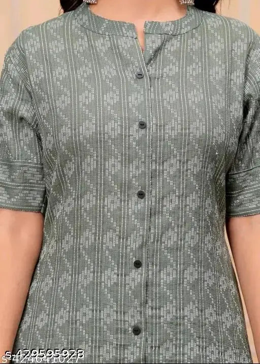 Green cotton blend kurti with palazzo featuring a printed net pattern, short sleeves. Single size available in M, L, XL, XXL. Indian handcrafted by Balaji creation