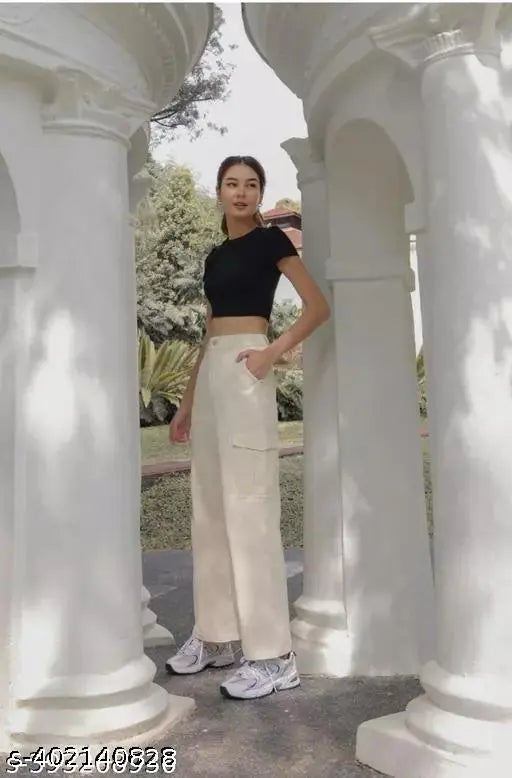 Khaki cargo pants on a woman wearing a black top