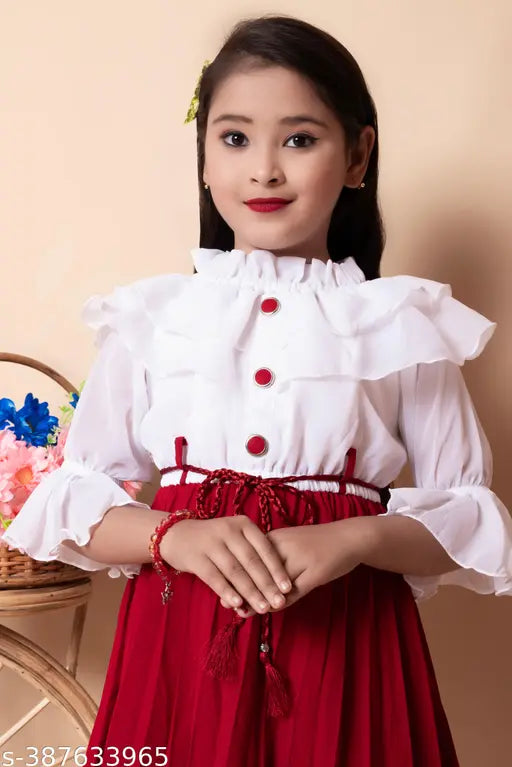 Crepe, three-quarter sleeve solid color partywear frock for 8-9 year old girls, often adorned with lace and ruffles