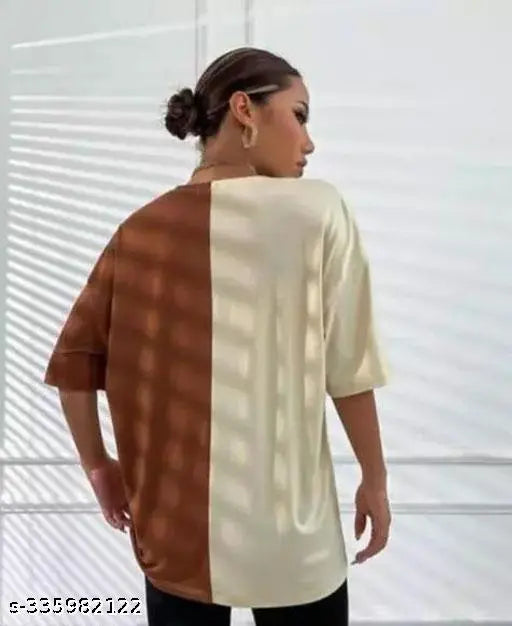 Woman wearing a two-tone printed t-shirt with butterfly print, oversized drop shoulder, round neck, and long sleeves. Pack of 2 combo