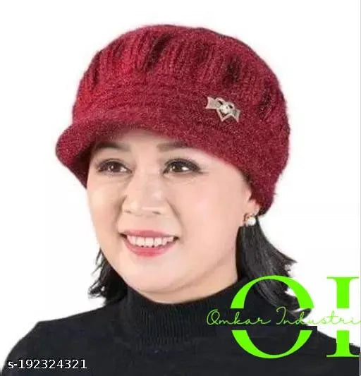 Attractive knitted winter hat for girls, soft wool material. Multi-colored design, best quality from Omkar Industries. Warm and snug fit