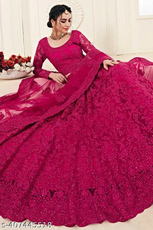 Embroidered net lehenga in wine, semi-stitched with embroidered dupatta, traditional Indian bridal wear
