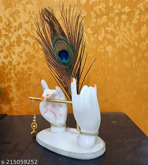 White ceramic statue of Lord Krishna playing a flute, standing on a white pedestal