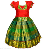 Handmade traditional grand pattu pavadai for kids, cotton lehenga with embellished pattern and short sleeves. High-quality pattu pavadai featuring heavy stone work, Indian origin
