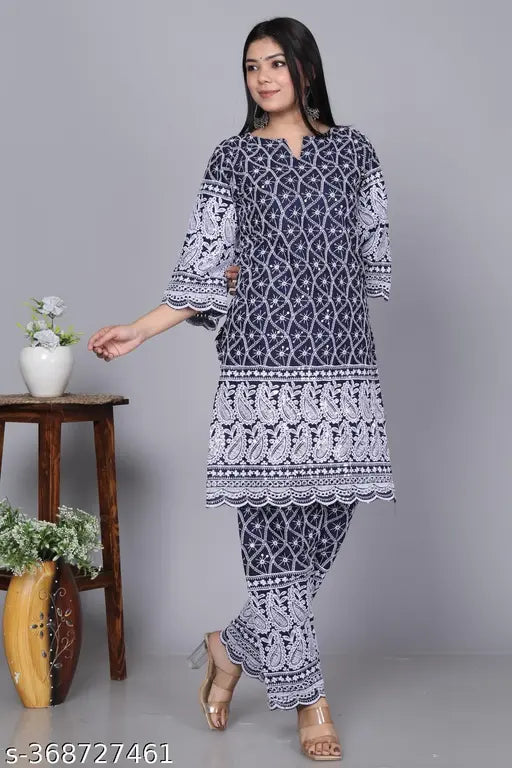 Designer DM Chikankari Set - Cotton blend kurta & pants set featuring intricate hand-embroidered floral patterns in pastel hues, ideal for warm weather