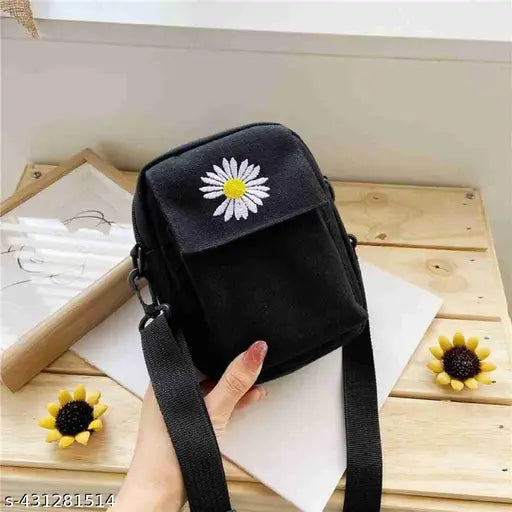 Fashionable black daisy print crossbody bag, adjustable strap