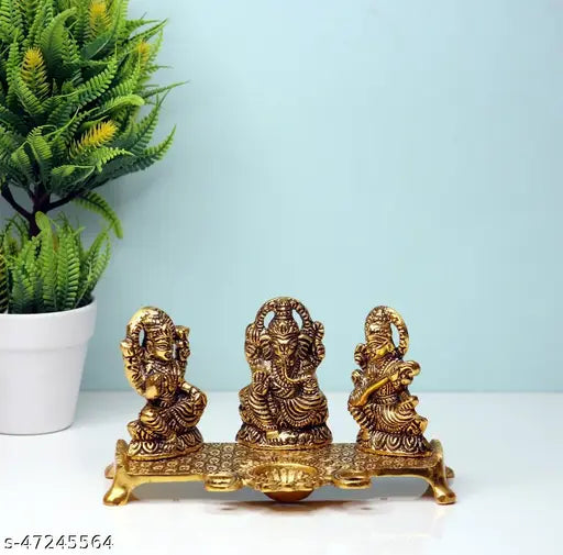 Metal Laxmi Ganesh Saraswati decorative idol with diya, 24cmx12cmx6cm, golden finish for home worship and decor