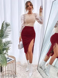 Ruby Maroon polyester mid-length skirt for women, solid design with fancy side cut