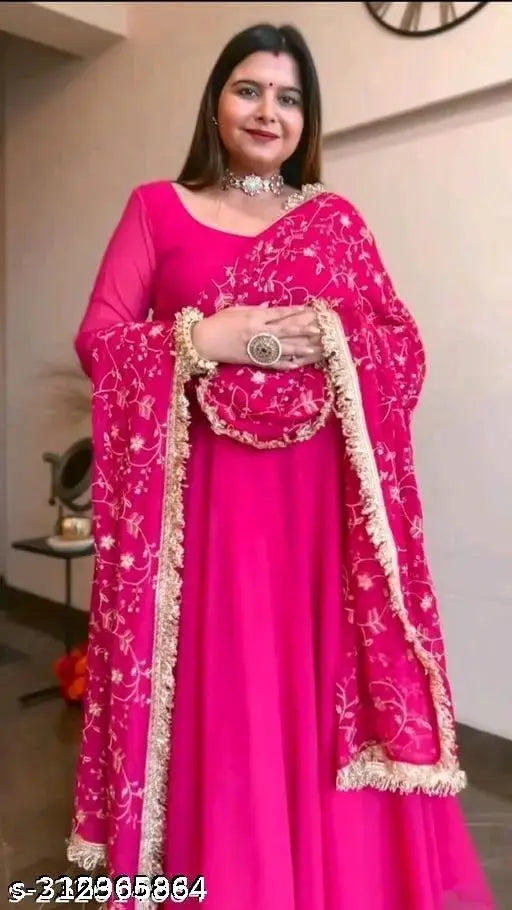 Pure Fox Georgette Fully Stitched Trendy Sleeves Pattern Gown with Fancy Sequin Sleeves and Jari Work, ready to wear. Long sleeved evening gown made from heavy soft fox Georgette fabric. Inner lining: micro cotton. Embroidery sequin and jari work border featuring fancy lace work. Approx. 53 inches in length, available in S-XXL sizes with varying measurements (details in description). Made in India
