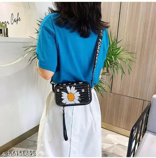 A mackup branded side purse for girls with a side belt and hand strap, black and white color