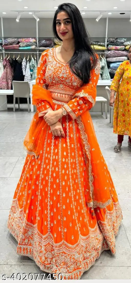 Orange Georgette Lehenga Choli Set - Festive Indian wedding wear with embroidered details, perfect for brides or guests