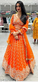 Orange Georgette Lehenga Choli Set - Festive Indian wedding wear with embroidered details, perfect for brides or guests