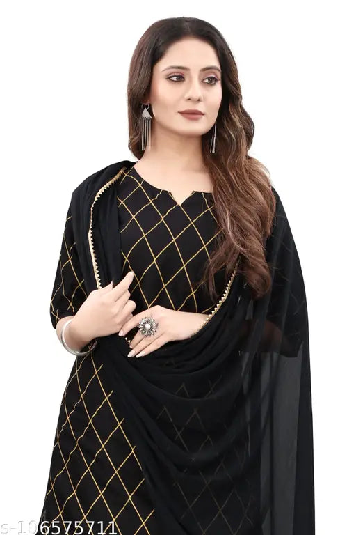 Gold printed women's kurta with sharara and dupatta set, knee-length