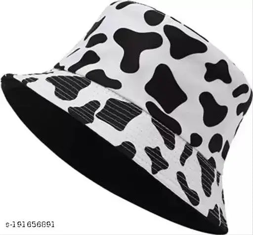 Stylish reversible bucket hat, black and white cow print design